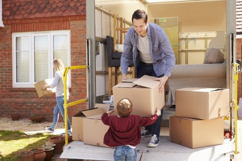 Moving boxes from a flat in North Harrow with a local removals van