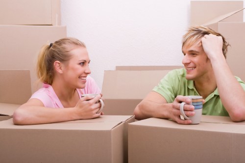 Packed moving boxes and furniture loaded into a removals van