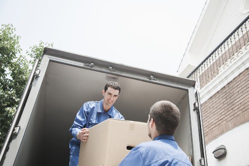 Office furniture and household items ready for transport by removals van